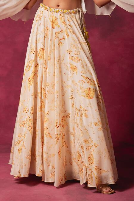 Buy Saundh Off White Crepe Crystals Round Neck Cornelia Foliage Print Cape Lehenga Set Online at Aza Fashions Buy_Saundh_Off White Crepe Crystals Round Neck Cornelia Foliage Print Cape Lehenga Set_Online_at_Aza_Fashions