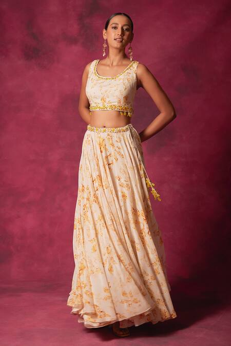 Saundh Off White Crepe Crystals Round Neck Cornelia Foliage Print Cape Lehenga Set at Aza Fashions Saundh_Off White Crepe Crystals Round Neck Cornelia Foliage Print Cape Lehenga Set_at_Aza_Fashions