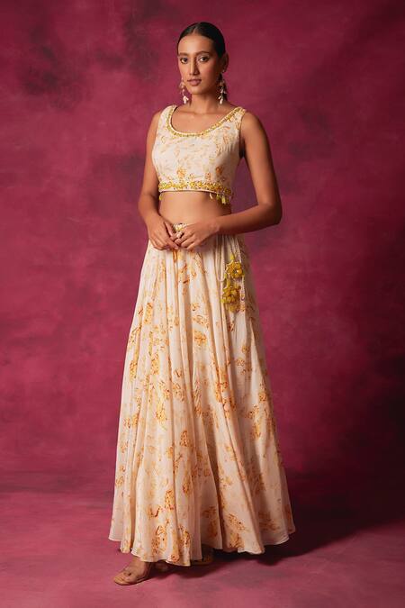 Buy Saundh Off White Crepe Crystals Round Neck Cornelia Foliage Print Cape Lehenga Set Buy_Saundh_Off White Crepe Crystals Round Neck Cornelia Foliage Print Cape Lehenga Set