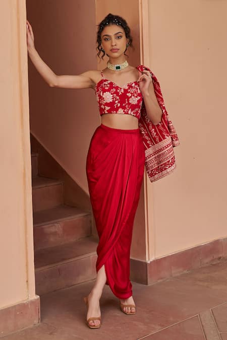 Chhavvi Aggarwal_Red Crepe, Satin Cut Work, Sequins V-neck Embroidered Cape Draped Skirt Set _at_Aza_Fashions