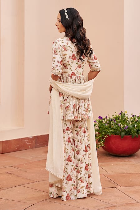 Shop Chhavvi Aggarwal Ivory Crepe, Lurex, Georgette Beads, Sequins, Printed Peplum Kurta Sharara Set at Aza Fashions Shop_Chhavvi Aggarwal_Ivory Crepe, Lurex, Georgette Beads, Sequins, Printed Peplum Kurta Sharara Set _at_Aza_Fashions