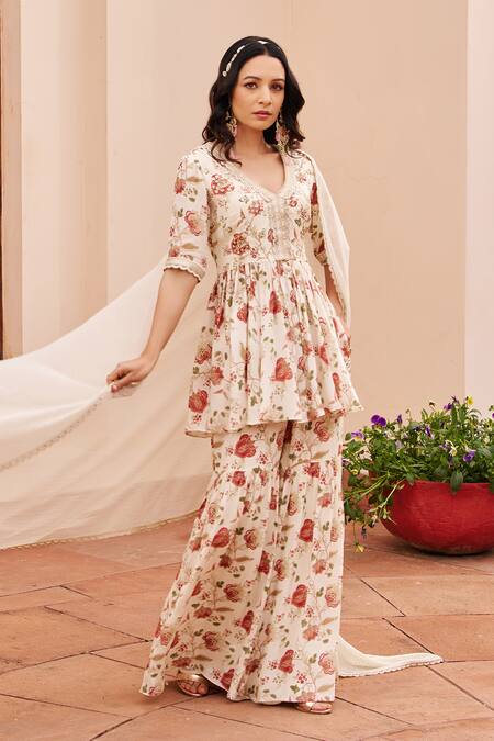 Chhavvi Aggarwal Ivory Crepe, Lurex, Georgette Beads, Sequins, Printed Peplum Kurta Sharara Set Online at Aza Fashions Chhavvi Aggarwal_Ivory Crepe, Lurex, Georgette Beads, Sequins, Printed Peplum Kurta Sharara Set _Online_at_Aza_Fashions