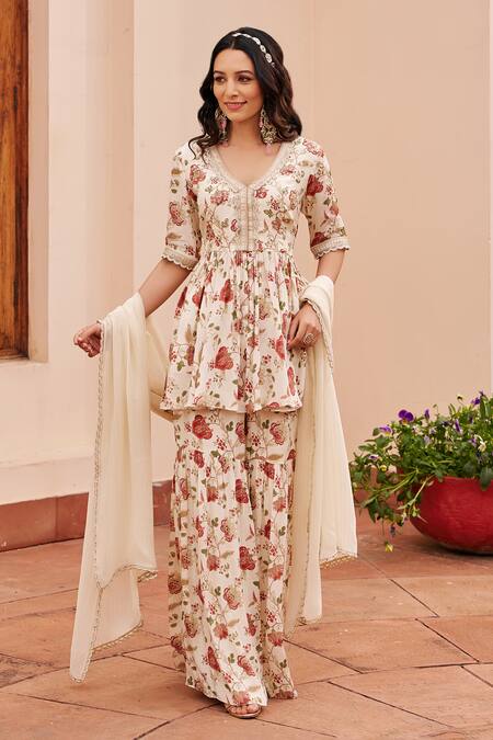 Shop Chhavvi Aggarwal Ivory Crepe, Lurex, Georgette Beads, Sequins, Printed Peplum Kurta Sharara Set Online at Aza Fashions Shop_Chhavvi Aggarwal_Ivory Crepe, Lurex, Georgette Beads, Sequins, Printed Peplum Kurta Sharara Set _Online_at_Aza_Fashions