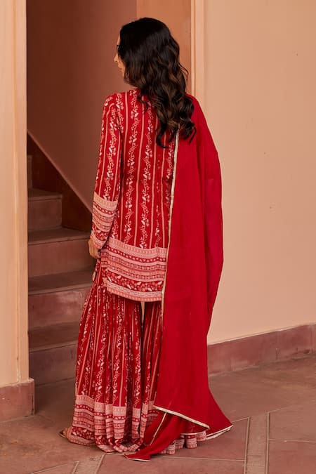 Shop Chhavvi Aggarwal Red Georgette Embroidery, Sequins, Cut Floral Stripe Print Kurta Sharara Set at Aza Fashions Shop_Chhavvi Aggarwal_Red Georgette Embroidery, Sequins, Cut Floral Stripe Print Kurta Sharara Set _at_Aza_Fashions