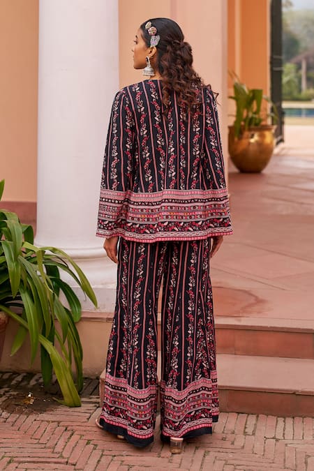 Shop Chhavvi Aggarwal Black Crepe Sequins, Beads V-neck Floral Print Cape Palazzo Set at Aza Fashions Shop_Chhavvi Aggarwal_Black Crepe Sequins, Beads V-neck Floral Print Cape Palazzo Set _at_Aza_Fashions