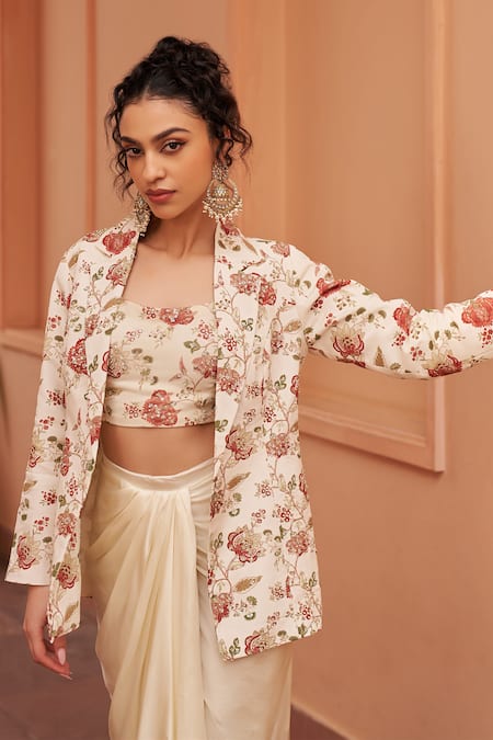 Chhavvi Aggarwal Ivory Satin, Crepe Sequins, Blossom Print Embellished Jacket Skirt Set Online at Aza Fashions Chhavvi Aggarwal_Ivory Satin, Crepe Sequins, Blossom Print Embellished Jacket Skirt Set _Online_at_Aza_Fashions