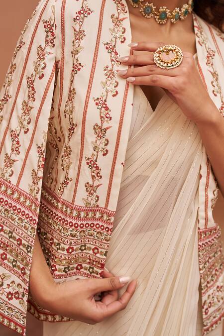 Chhavvi Aggarwal Ivory Georgette Embroidery Stripe Pattern Pre-draped Saree Set With Printed Cape Online at Aza Fashions Chhavvi Aggarwal_Ivory Georgette Embroidery Stripe Pattern Pre-draped Saree Set With Printed Cape _Online_at_Aza_Fashions