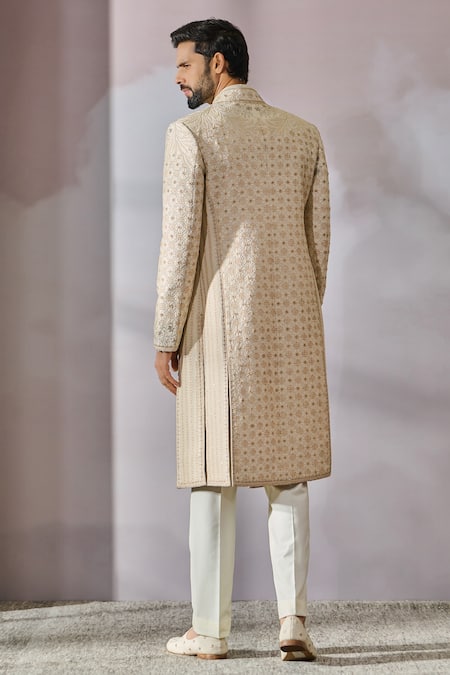 Shop Tarun Tahiliani Ivory Silk Dupion Embroidered Geometric Panel Sherwani Trouser Set at Aza Fashions Shop_Tarun Tahiliani_Ivory Silk Dupion Embroidered Geometric Panel Sherwani Trouser Set _at_Aza_Fashions