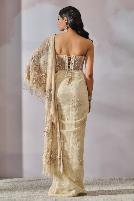 Shop Tarun Tahiliani Ivory Tulle, Chiffon Crystals, Embroidery Pre-draped Concept Saree With Corset at Aza Fashions Shop_Tarun Tahiliani_Ivory Tulle, Chiffon Crystals, Embroidery Pre-draped Concept Saree With Corset _at_Aza_Fashions