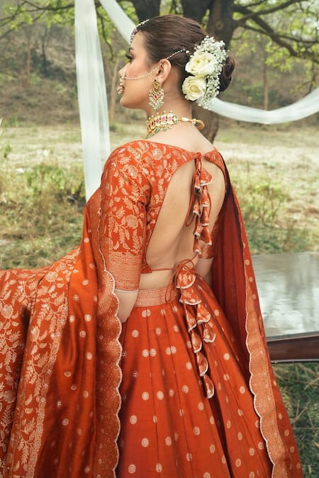 Safaa Orange Velvet, Viscose Embroidery The Minara Floral Booti Woven Lehenga Set at Aza Fashions Safaa_Orange Velvet, Viscose Embroidery The Minara Floral Booti Woven Lehenga Set _at_Aza_Fashions