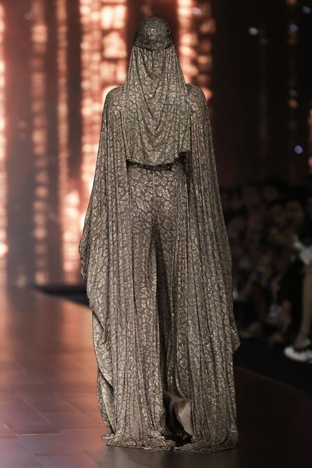 Shop Itrh Brown Net Printed Leopard Deep Cowl Neck Safari Chic Jumpsuit at Aza Fashions Shop_Itrh_Brown Net Printed Leopard Deep Cowl Neck Safari Chic Jumpsuit_at_Aza_Fashions