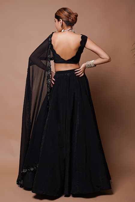 Shop Ahi Clothing Black Organza, Crepe, Linen Musk Bloom Cutwork Embellished Lehenga With Blouse at Aza Fashions Shop_Ahi Clothing_Black Organza, Crepe, Linen Musk Bloom Cutwork Embellished Lehenga With Blouse _at_Aza_Fashions