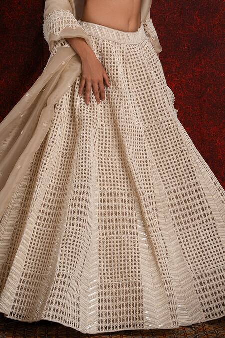 Shop_Shikha And Srishti Design_Ivory Crepe Sequins, Cut Work Asymmetric Embroidered Blouse And Lehenga Set _Online_at_Aza_Fashions