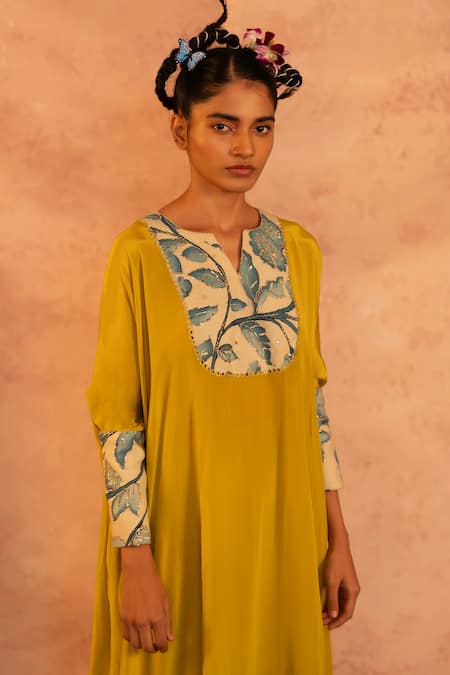 Shop Aamra By Lavanya Yellow Crape Hand Embroidery Mirror Notched Round Painted Kaftan And Pant Set at Aza Fashions Shop_Aamra By Lavanya_Yellow Crape Hand Embroidery Mirror Notched Round Painted Kaftan And Pant Set _at_Aza_Fashions