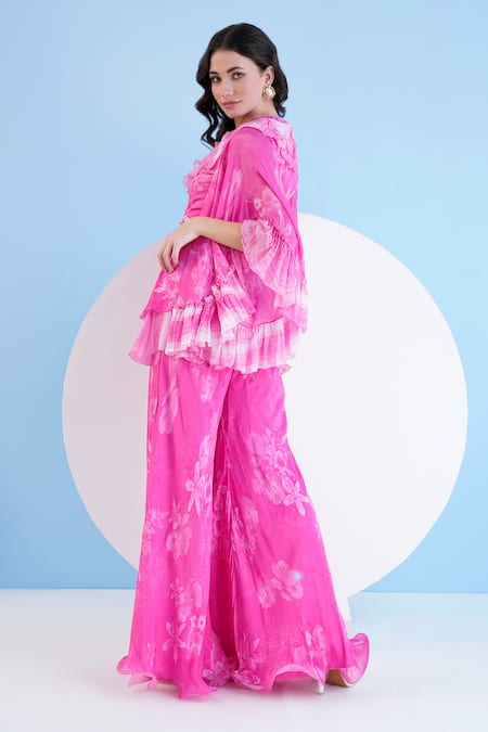 Shop Mandira Wirk Resort Pink Chiffon Ruffles V-neck Floral Print Top With Pant at Aza Fashions Shop_Mandira Wirk Resort_Pink Chiffon Ruffles V-neck Floral Print Top With Pant _at_Aza_Fashions