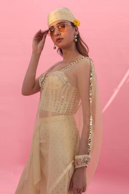 Prahnaaya Yellow Satin, Organza Sequins Asymmetric Yami Embroidered Skirt Set With Cape at Aza Fashions Prahnaaya_Yellow Satin, Organza Sequins Asymmetric Yami Embroidered Skirt Set With Cape _at_Aza_Fashions