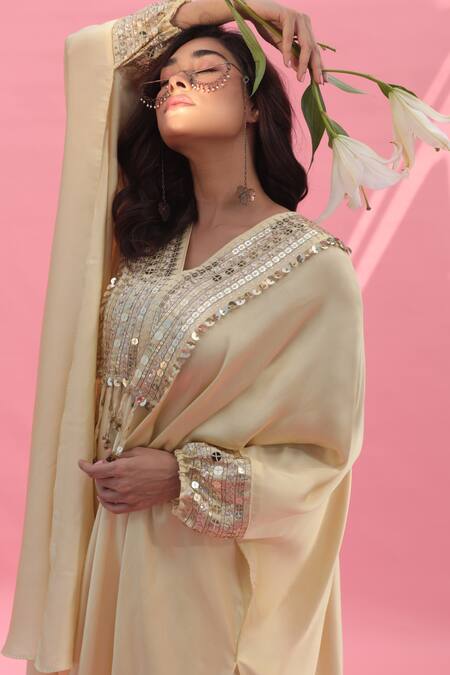 Prahnaaya Yellow Satin Sequins V-neck Mish Embroidered Kaftan With Wrap Skirt Online at Aza Fashions Prahnaaya_Yellow Satin Sequins V-neck Mish Embroidered Kaftan With Wrap Skirt _Online_at_Aza_Fashions