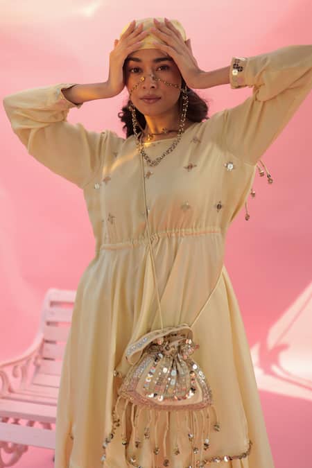 Buy Prahnaaya Yellow Satin Sequins Round Neck Saakura Embroidered Tunic With Dhoti Skirt Online at Aza Fashions Buy_Prahnaaya_Yellow Satin Sequins Round Neck Saakura Embroidered Tunic With Dhoti Skirt _Online_at_Aza_Fashions