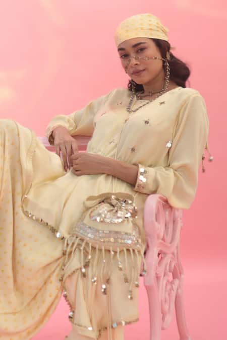 Shop Prahnaaya Yellow Embroidery, Sequins Sakura Potli Bag at Aza Fashions Shop_Prahnaaya_Yellow Embroidery, Sequins Sakura Potli Bag _at_Aza_Fashions