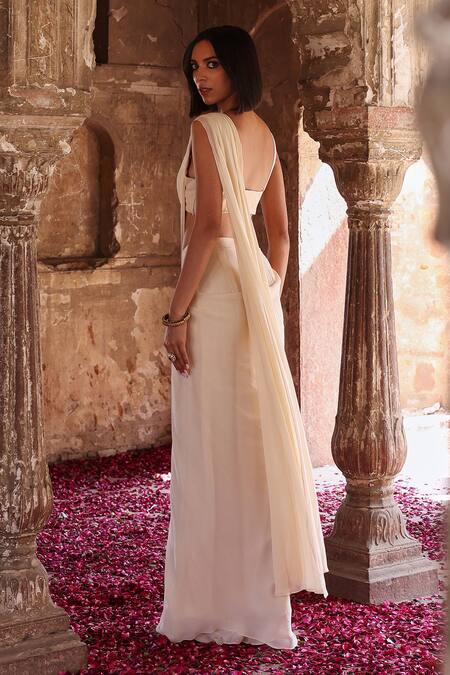 Seema Thukral Ivory Georgette Pearls, Sequins, Diya Embellished Cape Pre-stitched Saree Set Online at Aza Fashions Seema Thukral_Ivory Georgette Pearls, Sequins, Diya Embellished Cape Pre-stitched Saree Set _Online_at_Aza_Fashions