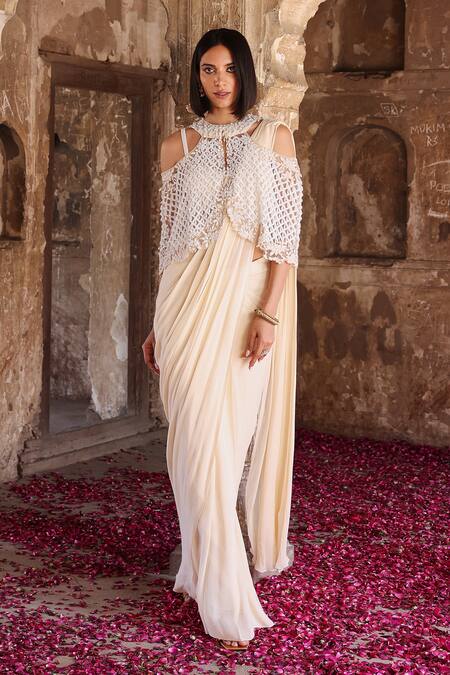 Buy Seema Thukral Ivory Georgette Pearls, Sequins, Diya Embellished Cape Pre-stitched Saree Set Buy_Seema Thukral_Ivory Georgette Pearls, Sequins, Diya Embellished Cape Pre-stitched Saree Set