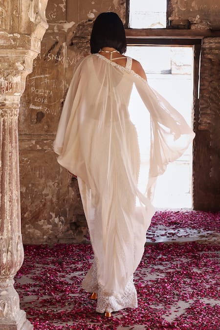 Seema Thukral Ivory Georgette, Silk Pearls, Sequins, Beads, Niveda Embellished Cape Pant Set Online at Aza Fashions Seema Thukral_Ivory Georgette, Silk Pearls, Sequins, Beads, Niveda Embellished Cape Pant Set _Online_at_Aza_Fashions