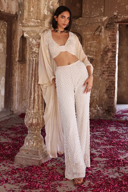 Seema Thukral Ivory Georgette, Silk Pearls, Sequins, Beads, Niveda Embellished Cape Pant Set at Aza Fashions Seema Thukral_Ivory Georgette, Silk Pearls, Sequins, Beads, Niveda Embellished Cape Pant Set _at_Aza_Fashions