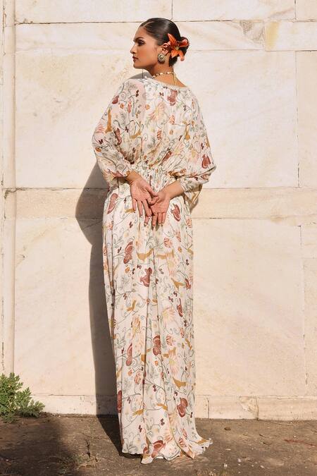 Shop Seema Thukral Ivory Georgette, Satin Embroidery, Mirrors, Aarvi Embellished Gathered Kaftan at Aza Fashions Shop_Seema Thukral_Ivory Georgette, Satin Embroidery, Mirrors, Aarvi Embellished Gathered Kaftan _at_Aza_Fashions