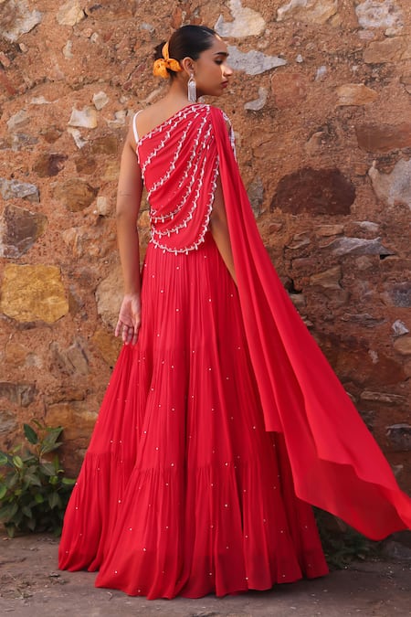 Shop Seema Thukral Coral Chiffon, Satin Pearls, Sequins, Zari Disha Embroidered Choli And Skirt Set at Aza Fashions Shop_Seema Thukral_Coral Chiffon, Satin Pearls, Sequins, Zari Disha Embroidered Choli And Skirt Set _at_Aza_Fashions