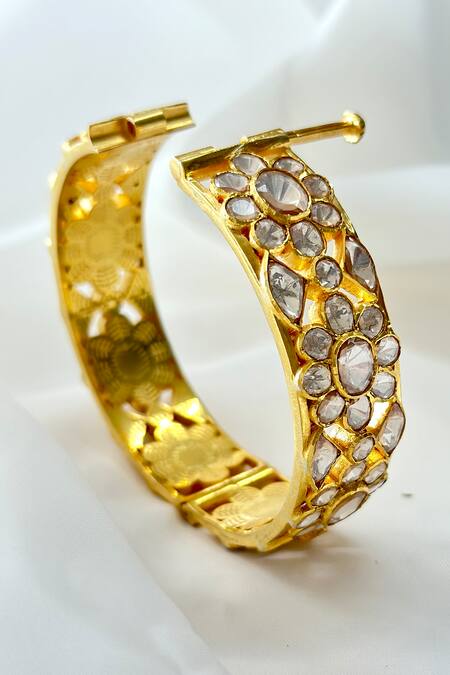 Osvag India Gold Plated Crystals, Diamonds Floral Cutwork Bangle Online at Aza Fashions Osvag India_Gold Plated Crystals, Diamonds Floral Cutwork Bangle _Online_at_Aza_Fashions