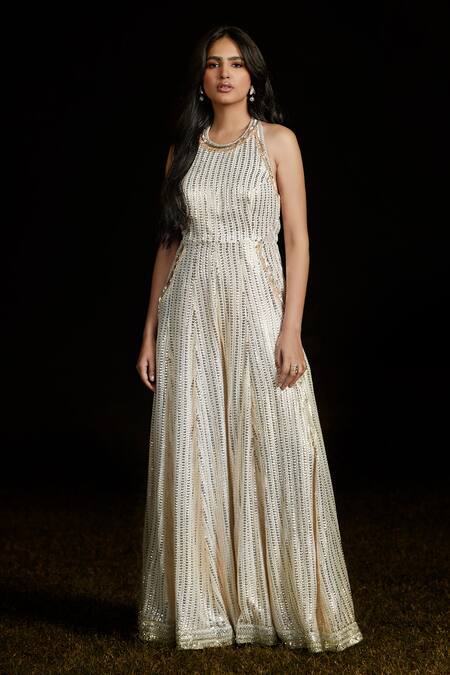 Basanti - Kapde Aur Koffee_Ivory Georgette Embroidery Halter Neck Sequin Flared Jumpsuit_Online_at_Aza_Fashions