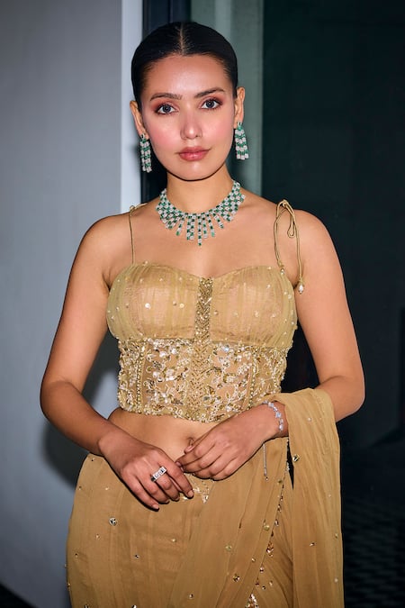 Label Sanya Gulati_Gold Georgette, Net Sequins, Beads, Embroidered Tiered Lehenga Saree With Blouse _at_Aza_Fashions