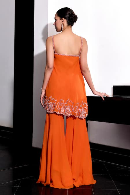 Shop Label Sanya Gulati Orange Georgette Sequins Square Neck Embroidered Top And Bell Bottom Pant Set at Aza Fashions Shop_Label Sanya Gulati_Orange Georgette Sequins Square Neck Embroidered Top And Bell Bottom Pant Set _at_Aza_Fashions