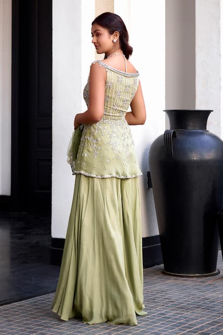 Shop Label Sanya Gulati Green Georgette Embroidery, Sequins, Cut Work V-neck Peplum Kurta Sharara Set at Aza Fashions Shop_Label Sanya Gulati_Green Georgette Embroidery, Sequins, Cut Work V-neck Peplum Kurta Sharara Set _at_Aza_Fashions