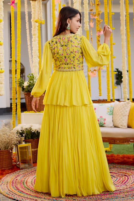 Shop Label Sanya Gulati Yellow Georgette Sequins, Cut Work, Embroidery Round Neck Peplum Top And Skirt Set at Aza Fashions Shop_Label Sanya Gulati_Yellow Georgette Sequins, Cut Work, Embroidery Round Neck Peplum Top And Skirt Set _at_Aza_Fashions