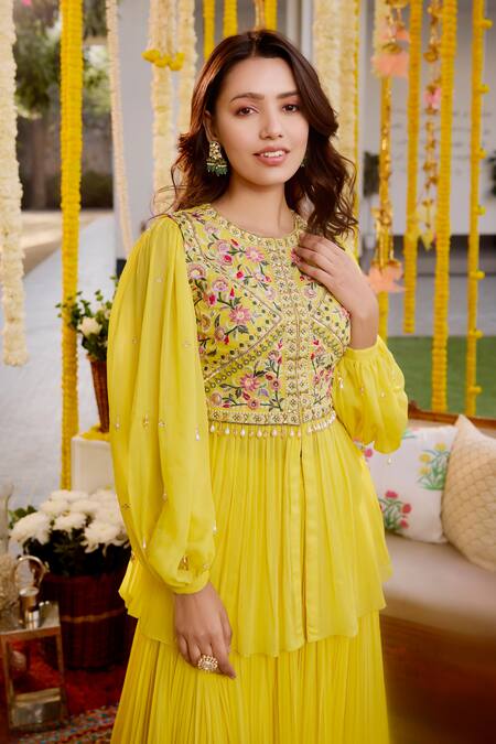 Label Sanya Gulati Yellow Georgette Sequins, Cut Work, Embroidery Round Neck Peplum Top And Skirt Set at Aza Fashions Label Sanya Gulati_Yellow Georgette Sequins, Cut Work, Embroidery Round Neck Peplum Top And Skirt Set _at_Aza_Fashions
