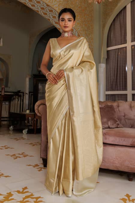 Geroo Jaipur Gold Silk Zari V-neck Handwoven Banarasi Saree With Unstitched Blouse Piece Online at Aza Fashions Geroo Jaipur_Gold Silk Zari V-neck Handwoven Banarasi Saree With Unstitched Blouse Piece _Online_at_Aza_Fashions
