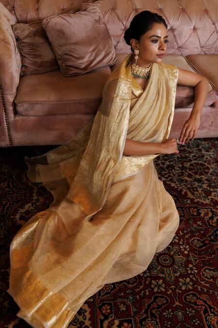 Geroo Jaipur Gold Tissue Zari Floral Vine Woven Saree With Unstitched Blouse Piece at Aza Fashions Geroo Jaipur_Gold Tissue Zari Floral Vine Woven Saree With Unstitched Blouse Piece _at_Aza_Fashions