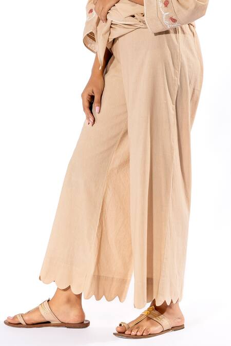 Pants And Pajamas Beige Cotton Embroidery V-neck Floral Thread Kurta And Flared Pant Set at Aza Fashions Pants And Pajamas_Beige Cotton Embroidery V-neck Floral Thread Kurta And Flared Pant Set _at_Aza_Fashions