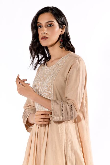 Pants And Pajamas Beige Cotton Embroidery Round Neck Kurta And Flared Pant Set at Aza Fashions Pants And Pajamas_Beige Cotton Embroidery Round Neck Kurta And Flared Pant Set _at_Aza_Fashions
