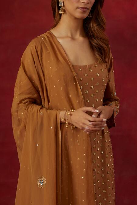 Ikshita Choudhary Brown Chanderi Silk, Tissue Sequins, Embroidery Plunge Neck Hand Kurta Pant Set at Aza Fashions Ikshita Choudhary_Brown Chanderi Silk, Tissue Sequins, Embroidery Plunge Neck Hand Kurta Pant Set _at_Aza_Fashions