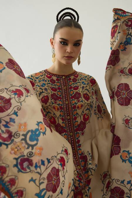 Rajdeep Ranawat_Beige Caprice Phool Print High Low Cape _at_Aza_Fashions