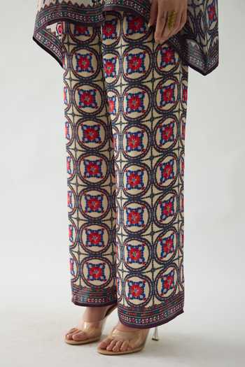 Buy Rajdeep Ranawat Multi Color Modal, Satin Permaz Geometric Print Flared Pant Buy_Rajdeep Ranawat_Multi Color Modal, Satin Permaz Geometric Print Flared Pant
