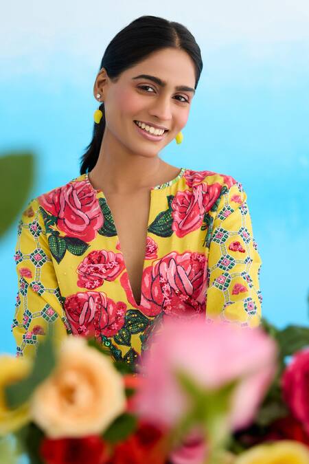 Nikasha_Yellow Modal, Satin Sequins, Beads Plunge Neck Rose Embroidered Short Tunic _at_Aza_Fashions