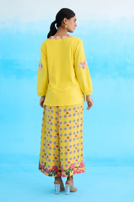 Shop Nikasha Yellow Cotton Embroidery Plunge Neck Ribbon Tunic at Aza Fashions Shop_Nikasha_Yellow Cotton Embroidery Plunge Neck Ribbon Tunic _at_Aza_Fashions