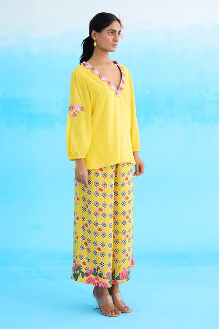 Nikasha Yellow Cotton Embroidery Plunge Neck Ribbon Tunic Online at Aza Fashions Nikasha_Yellow Cotton Embroidery Plunge Neck Ribbon Tunic _Online_at_Aza_Fashions