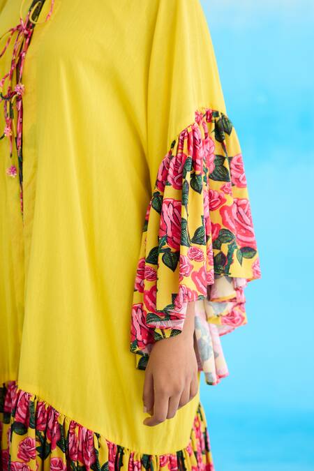 Nikasha Yellow Cotton Ruffles Round Neck Rose Print Frill Jacket Dress at Aza Fashions Nikasha_Yellow Cotton Ruffles Round Neck Rose Print Frill Jacket Dress _at_Aza_Fashions