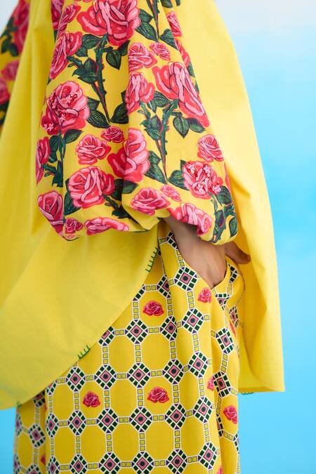 Shop Nikasha Yellow Cotton Sequins Bandeau Neck Rose Print Bubble Sleeve Raglan Shirt Online at Aza Fashions Shop_Nikasha_Yellow Cotton Sequins Bandeau Neck Rose Print Bubble Sleeve Raglan Shirt _Online_at_Aza_Fashions
