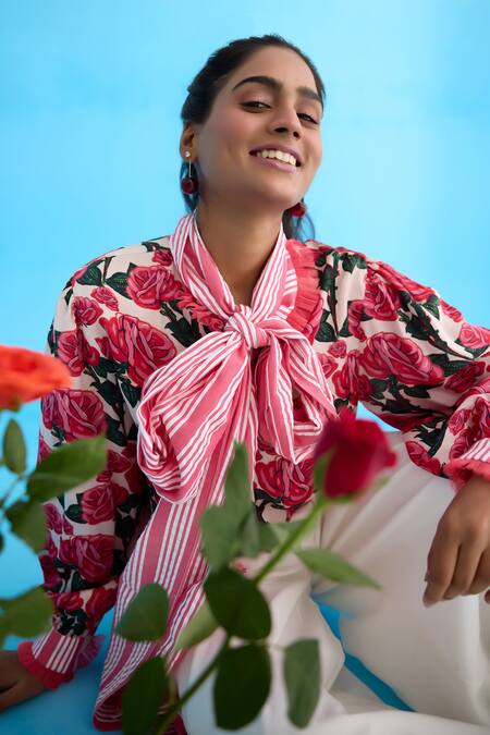 Nikasha Cream Modal, Satin Ribbons High Neck Vintage Rose Printed Bow Shirt at Aza Fashions Nikasha_Cream Modal, Satin Ribbons High Neck Vintage Rose Printed Bow Shirt _at_Aza_Fashions