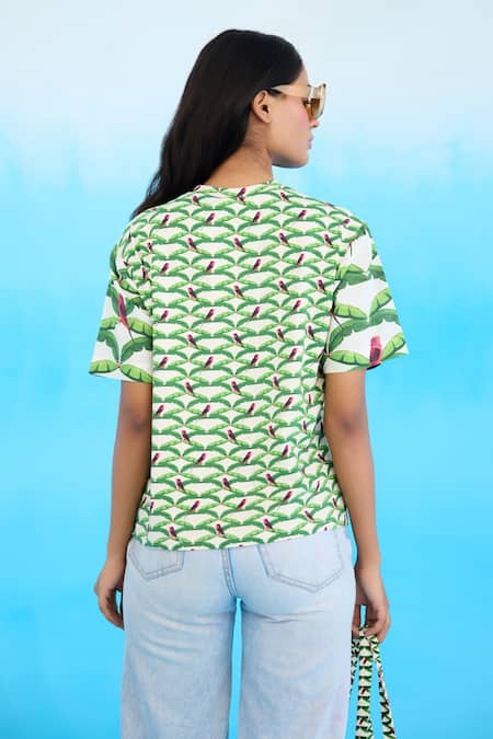 Shop Nikasha Ivory Cotton Sequins, Beads Crew Neck Parakeet Pattern T-shirt at Aza Fashions Shop_Nikasha_Ivory Cotton Sequins, Beads Crew Neck Parakeet Pattern T-shirt _at_Aza_Fashions